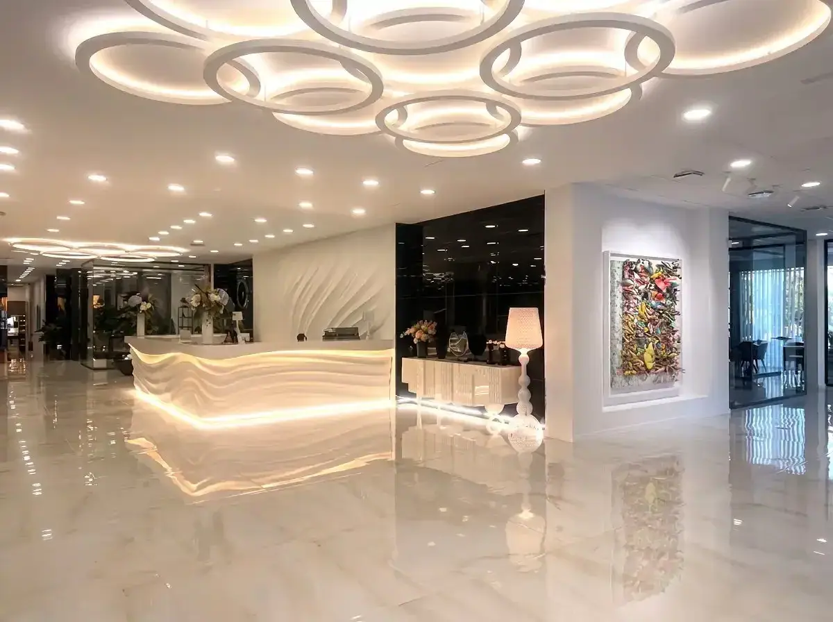 Lobby of the Valencia office, with the lit reception desk