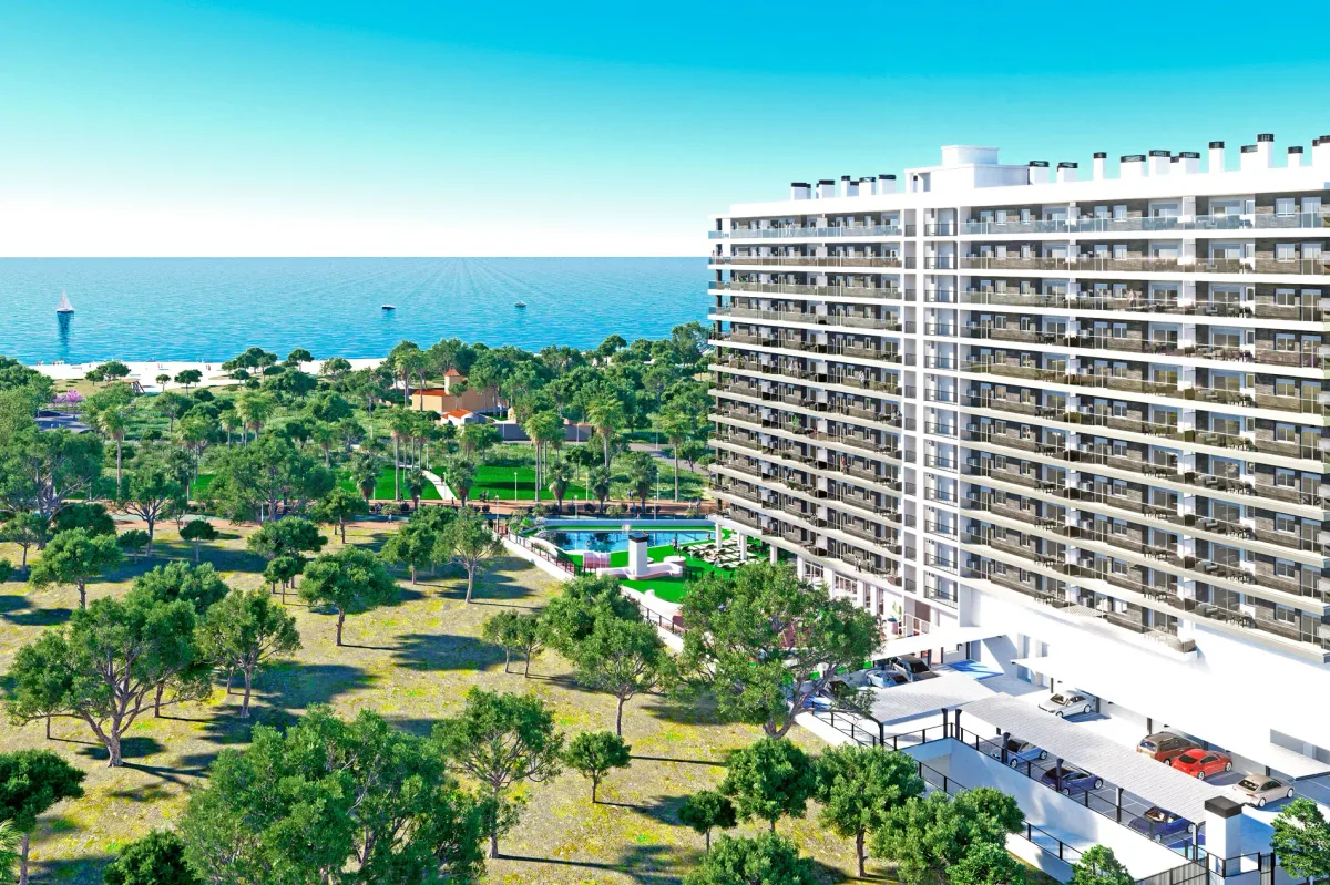 Recreación del Edificio Amanecer junto al mar, con su piscina y el arbolado del entorno